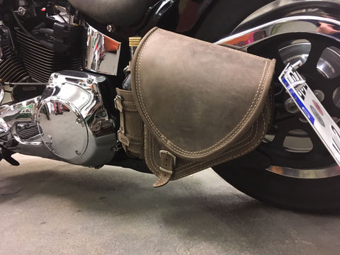 Diablo Brown swing bag with bottle cage fits Harley-Davidson Softail
